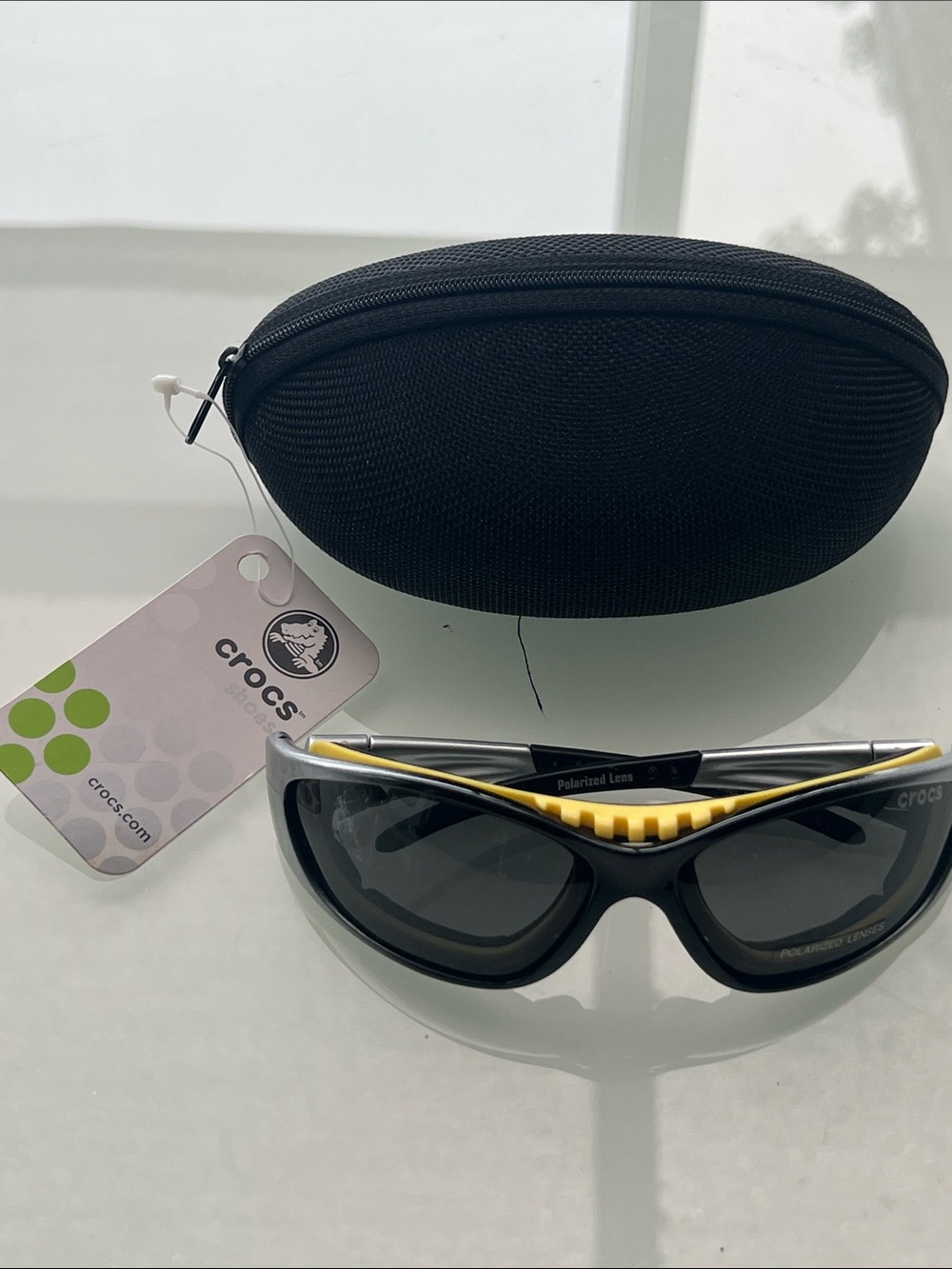 CROCS Polarized Black Sunglasses with Yellow Trim and Black Case